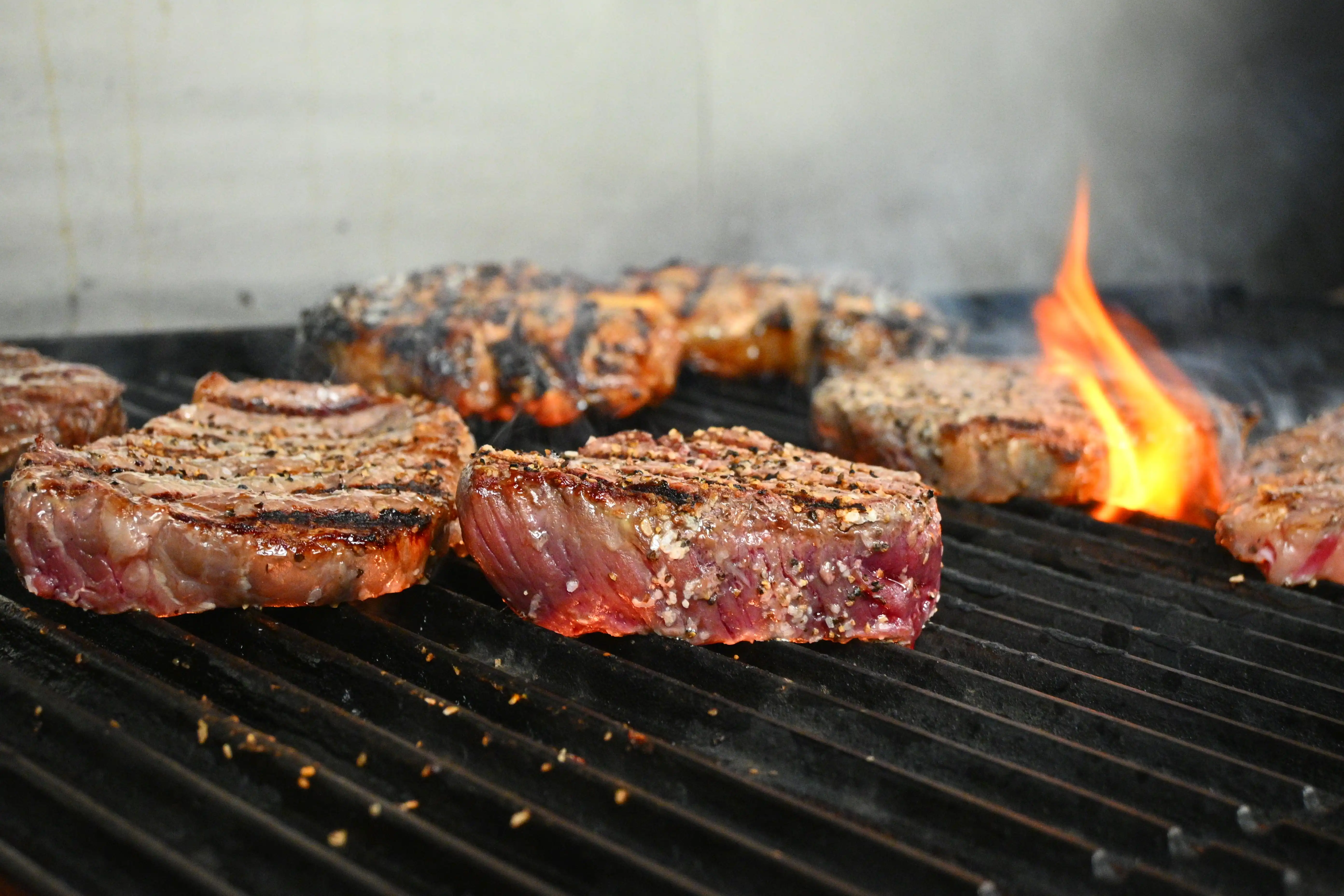 Steak on grill saturated